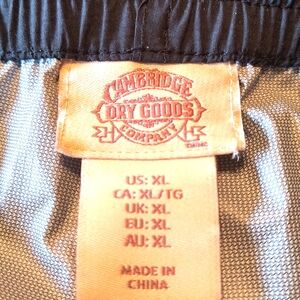 100% nylon, machine washable rain pants